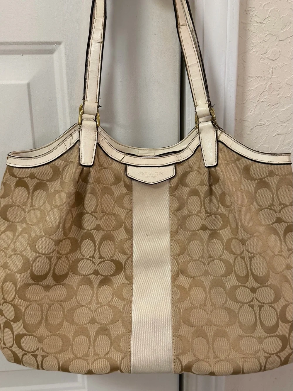 Coach Signature Canvas Beige Tote Bag with Ivory Trim handles are cracked!